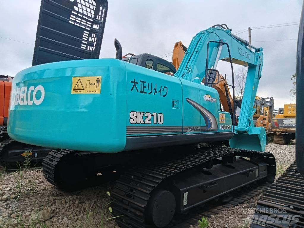 Kobelco SK 210 Гусеничні екскаватори