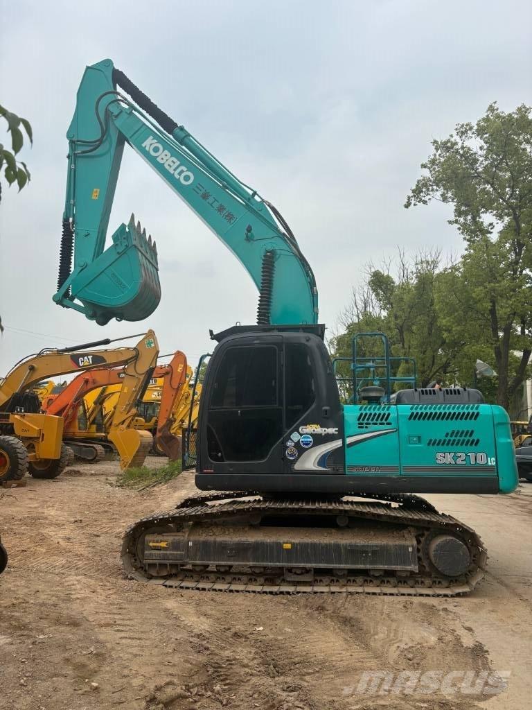 Kobelco SK 210 Гусеничні екскаватори