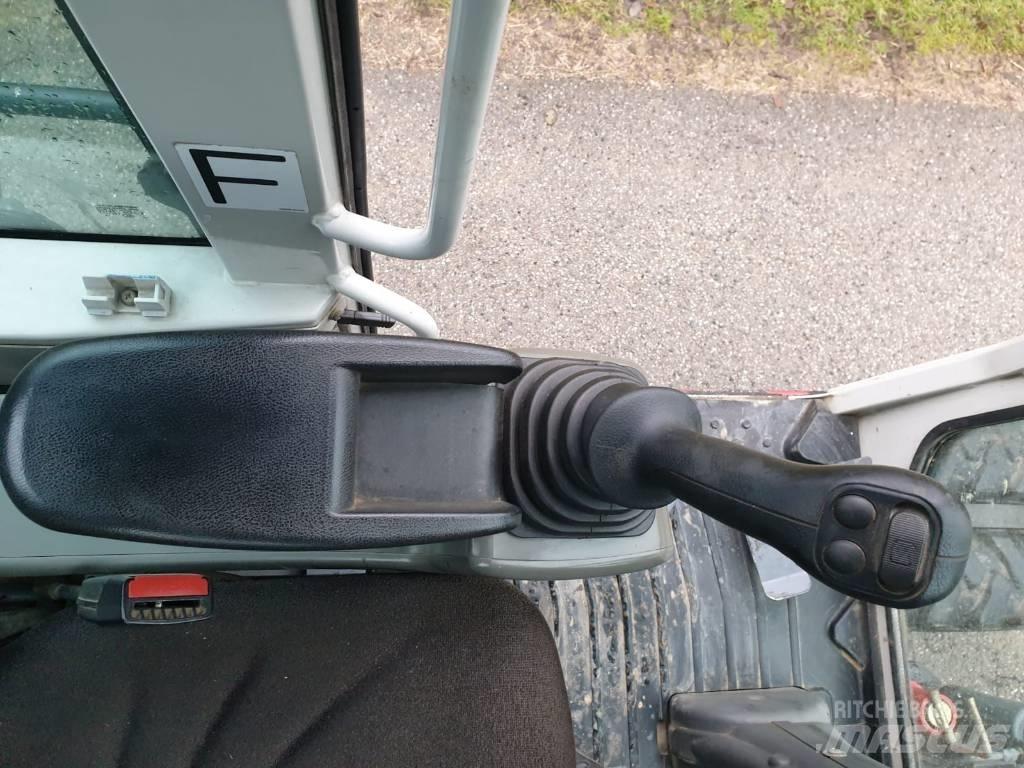Takeuchi TB 295 W Колісні екскаватори