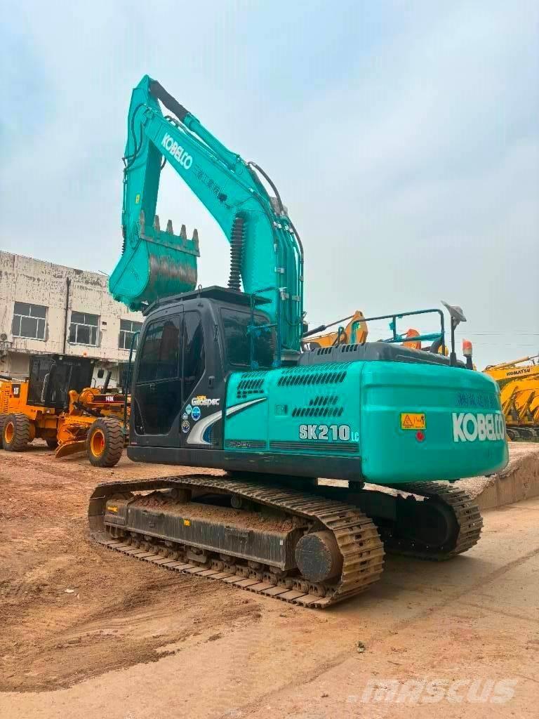 Kobelco SK 210 Гусеничні екскаватори