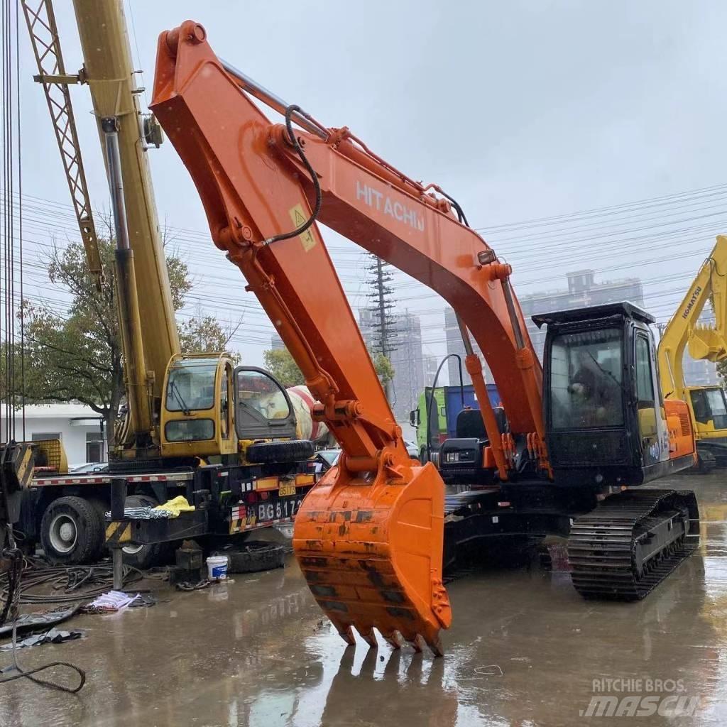 Hitachi ZX 210 Гусеничні екскаватори