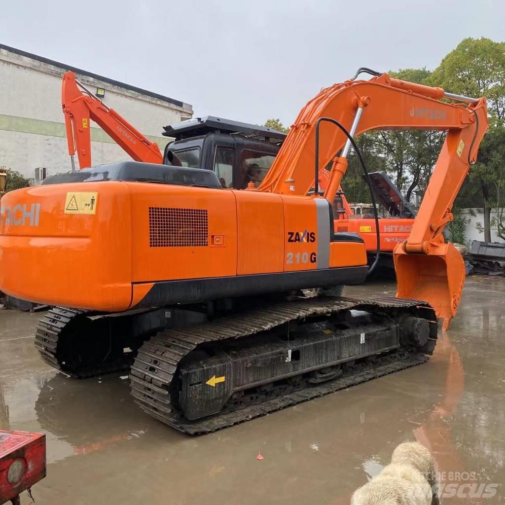 Hitachi ZX 210 Гусеничні екскаватори