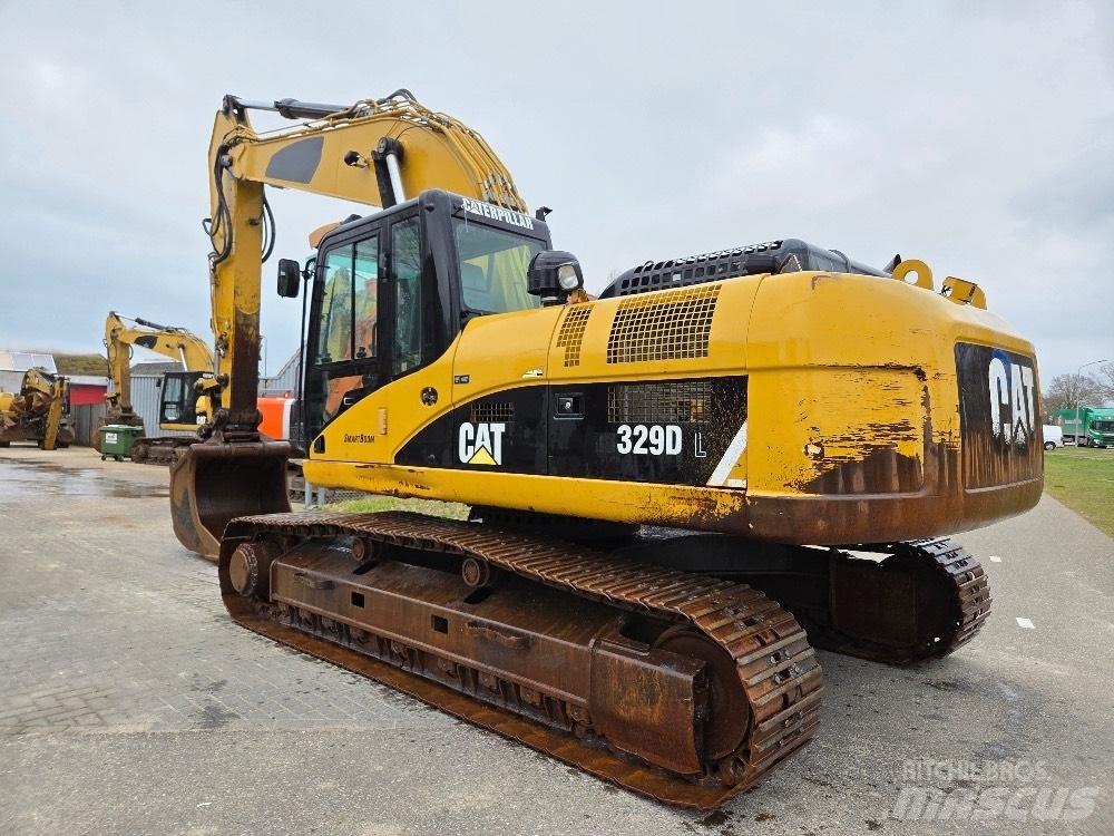 CAT 329DL Гусеничні екскаватори