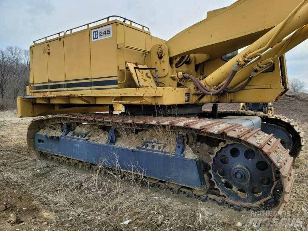 CAT 245 Гусеничні екскаватори
