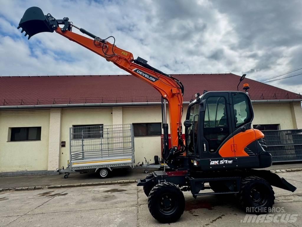Develon DX 57 W-7 Колісні екскаватори
