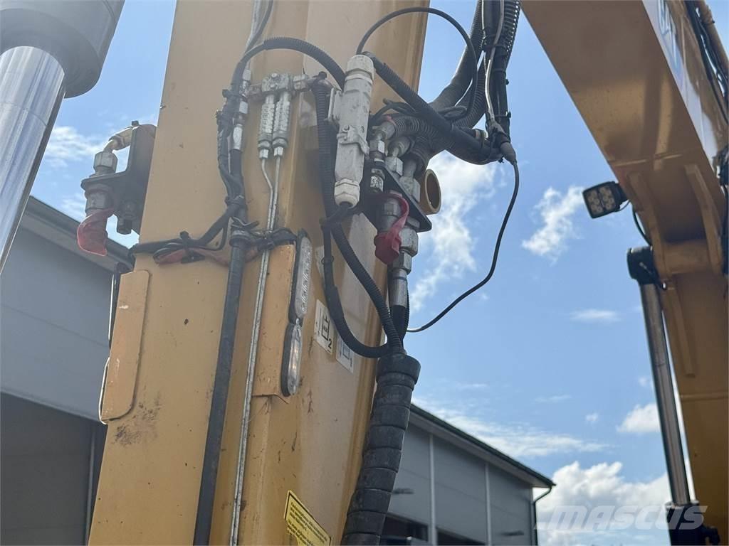 CAT 310 Середні екскаватори 7т. - 12т.