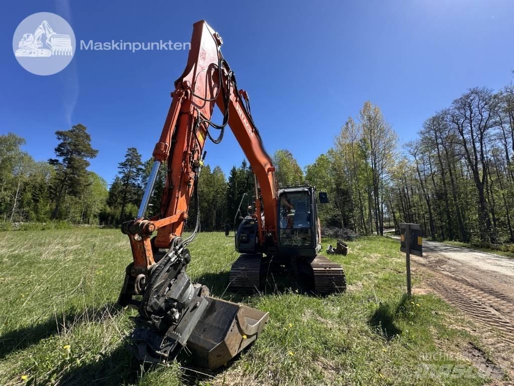 Hitachi ZX 135 US-6 Гусеничні екскаватори