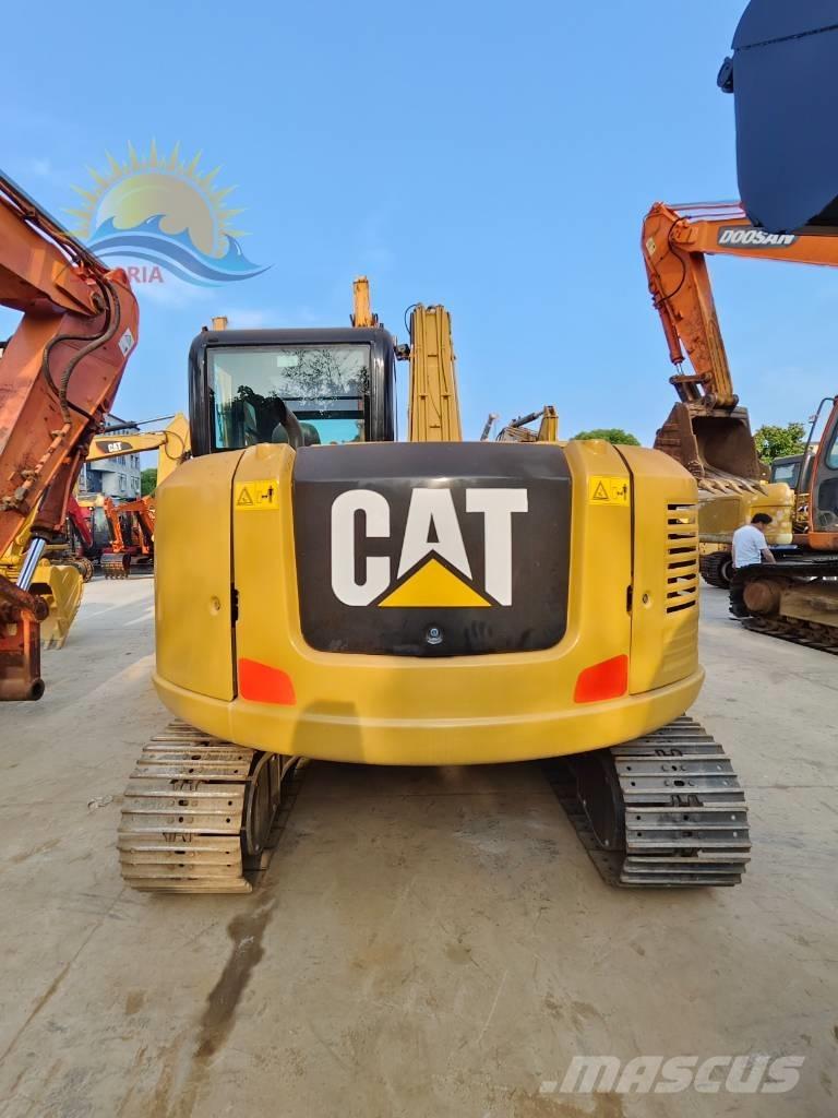 CAT 308e2 Середні екскаватори 7т. - 12т.