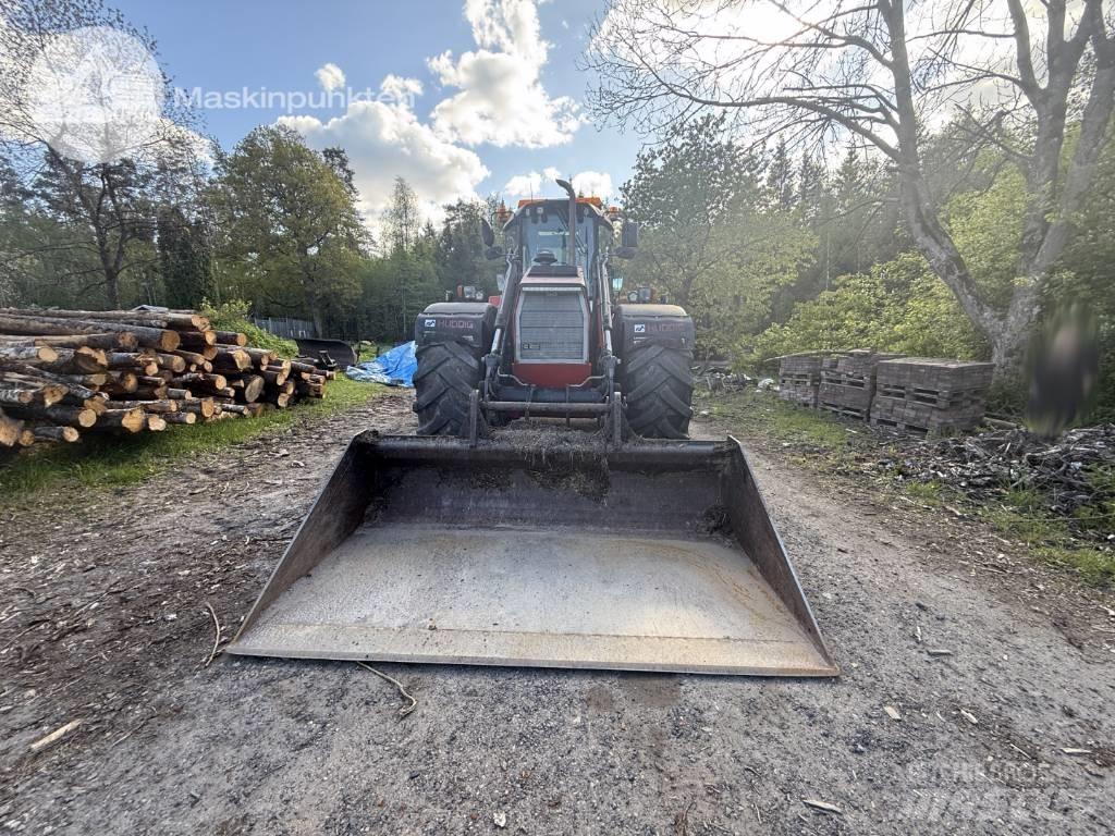Huddig 1260 B Екскаватори-навантажувачі