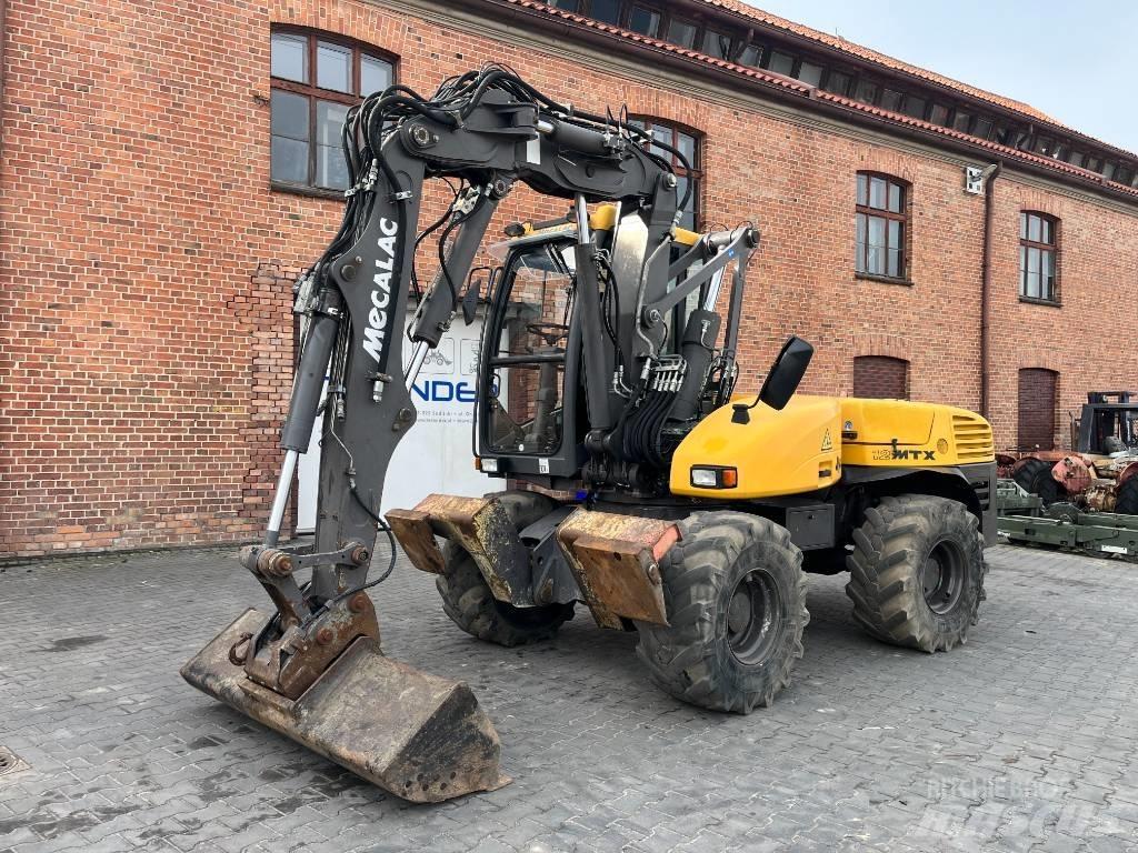 Mecalac 12 M TX Колісні екскаватори