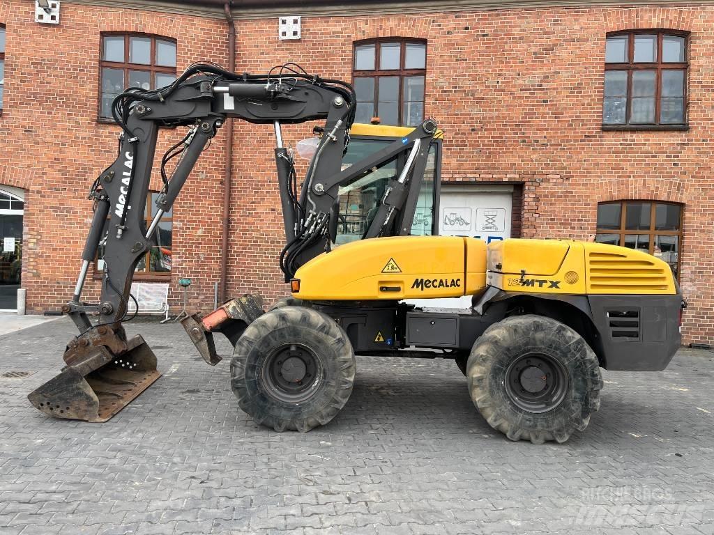 Mecalac 12 M TX Колісні екскаватори