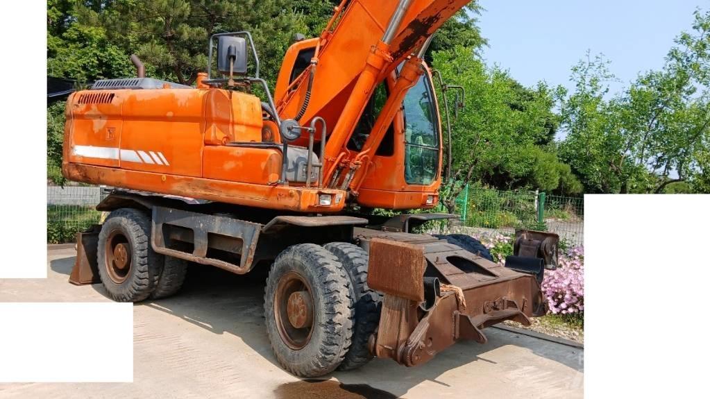 Doosan DX 210 W Колісні екскаватори