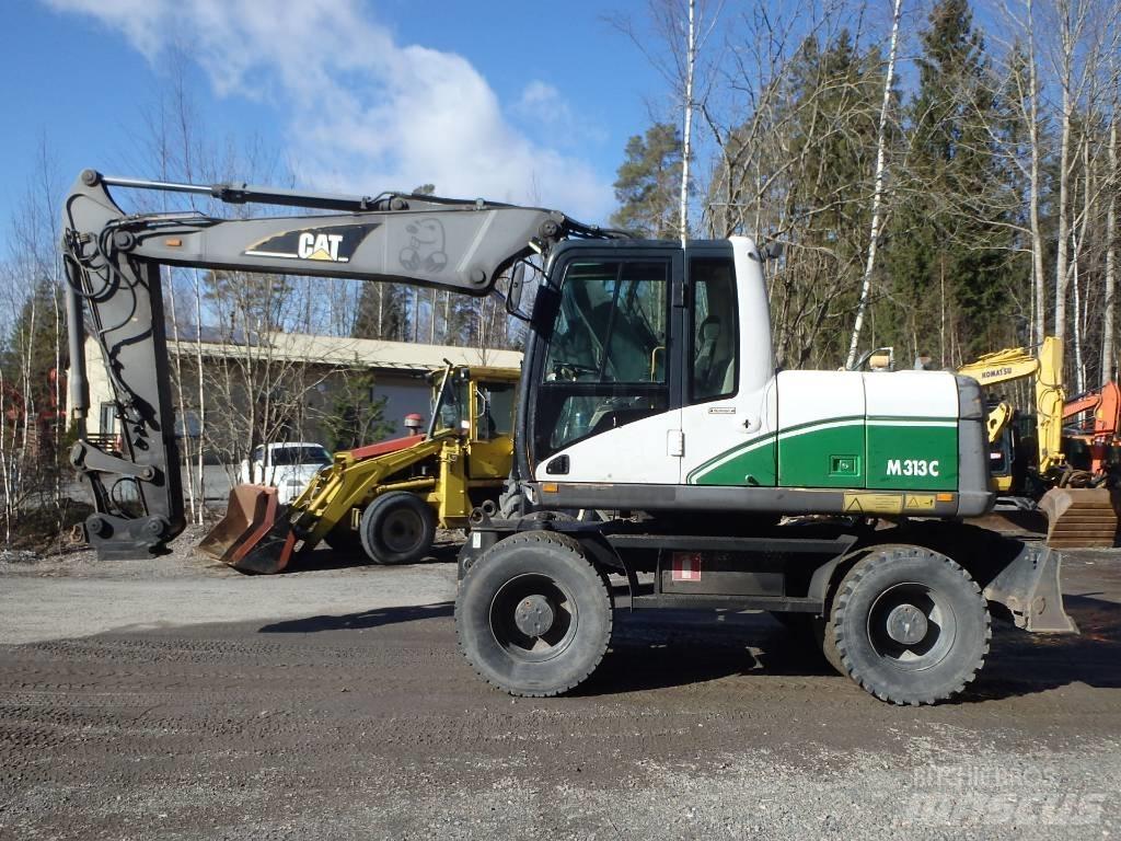 CAT M 313 C 4x4 Колісні екскаватори