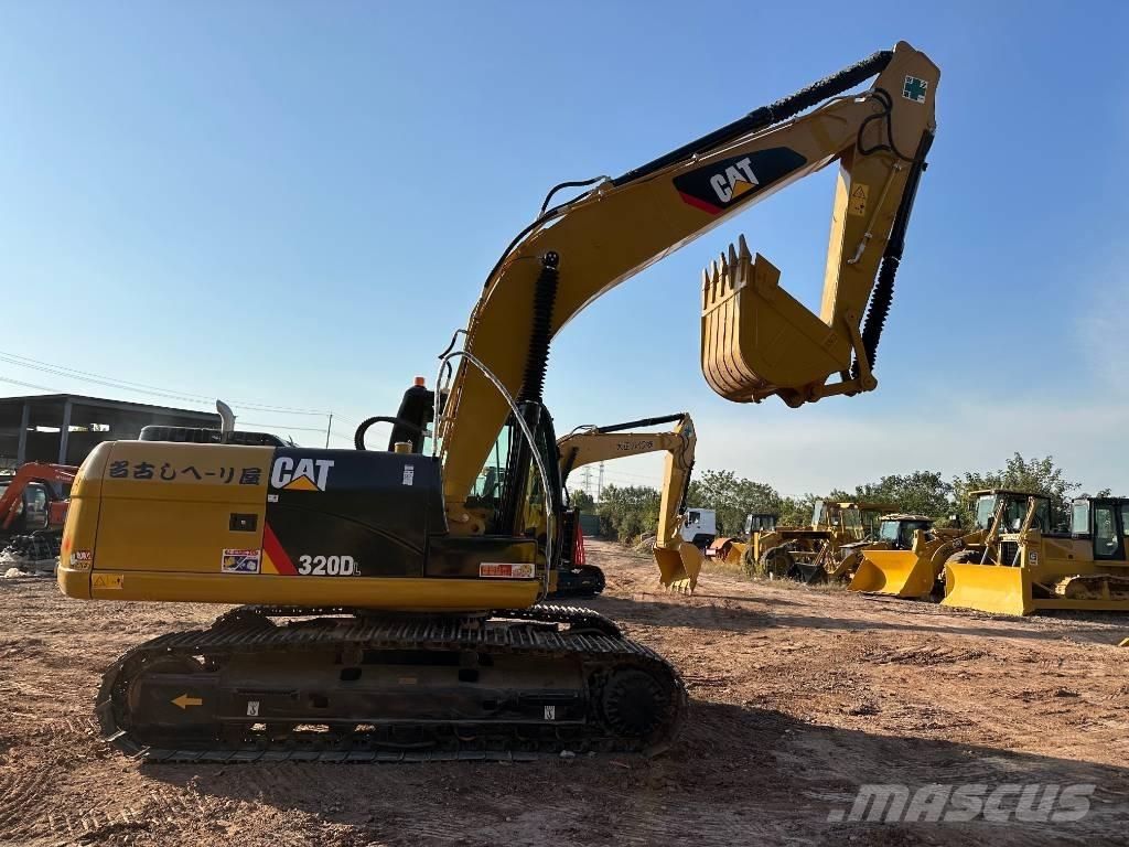 CAT 320DL Гусеничні екскаватори