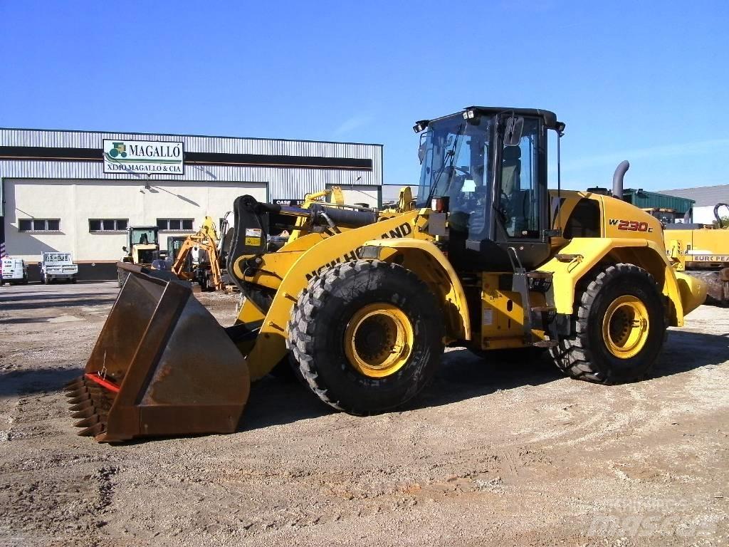 New Holland W 230 C Фронтальні навантажувачі