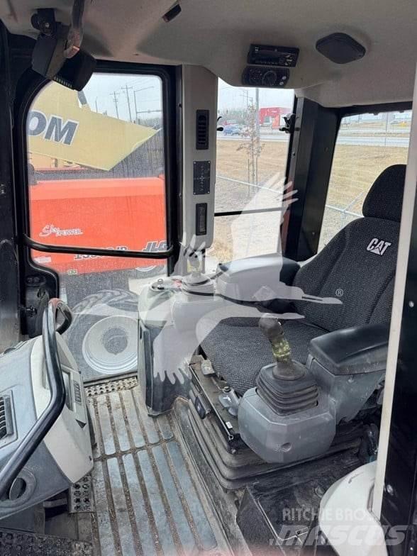 CAT 963K Гусеничні вантажники