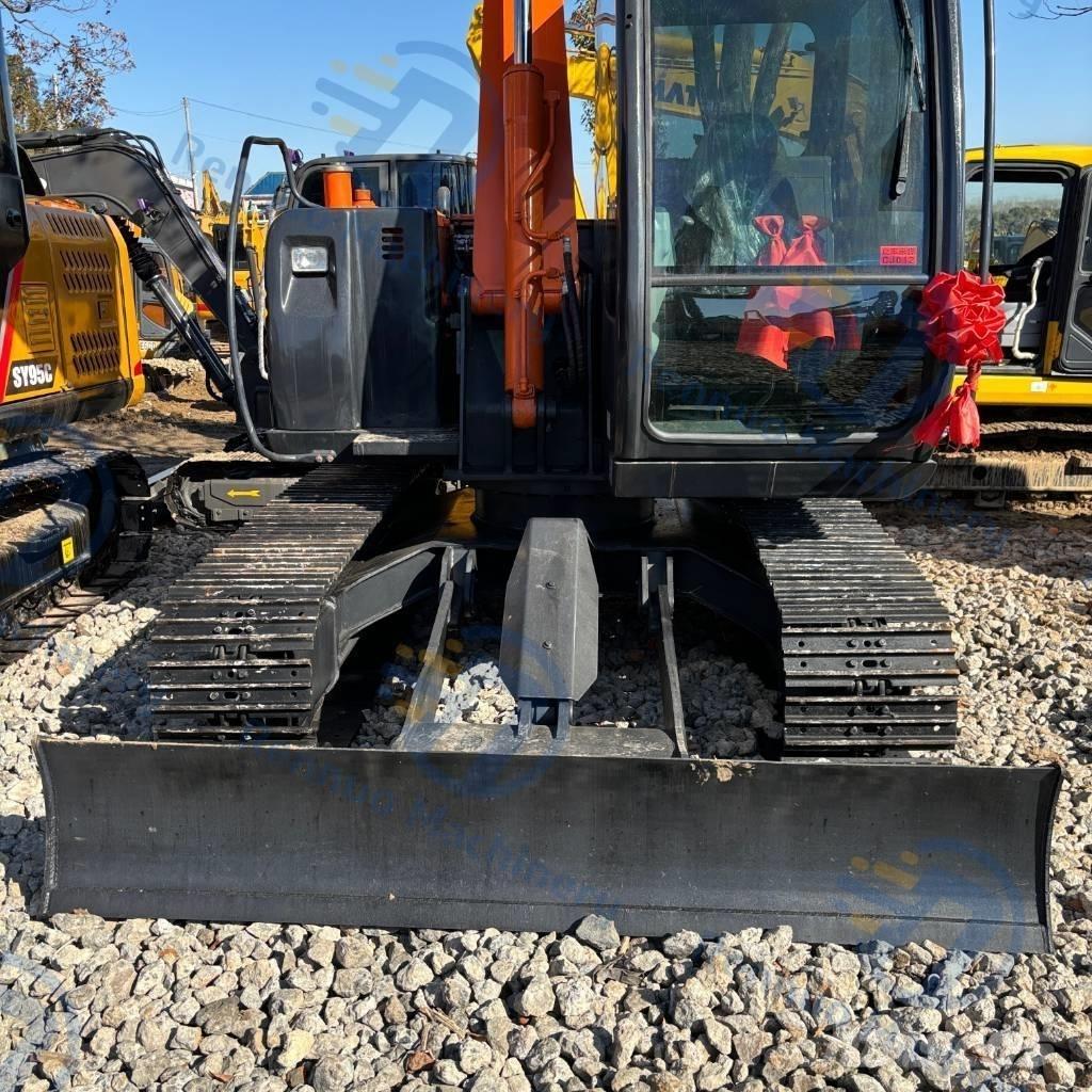 Hitachi ZX70 Міні-екскаватори < 7т