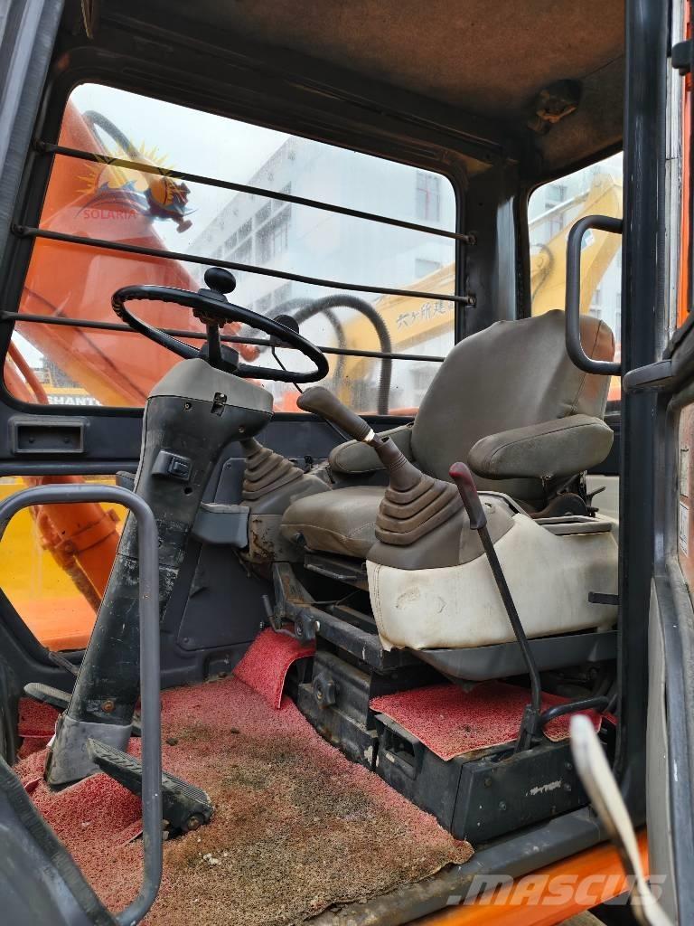 Hitachi EX 100 W D Колісні екскаватори