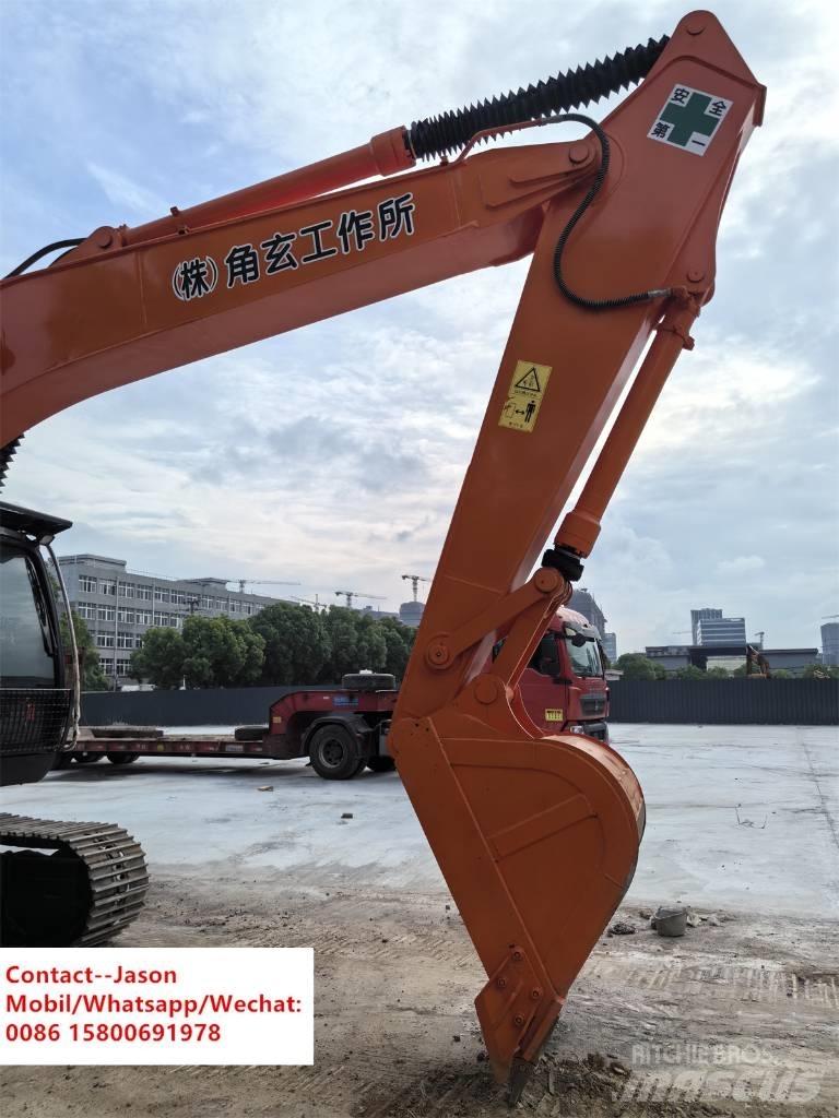 Hitachi ZX 200 Гусеничні екскаватори