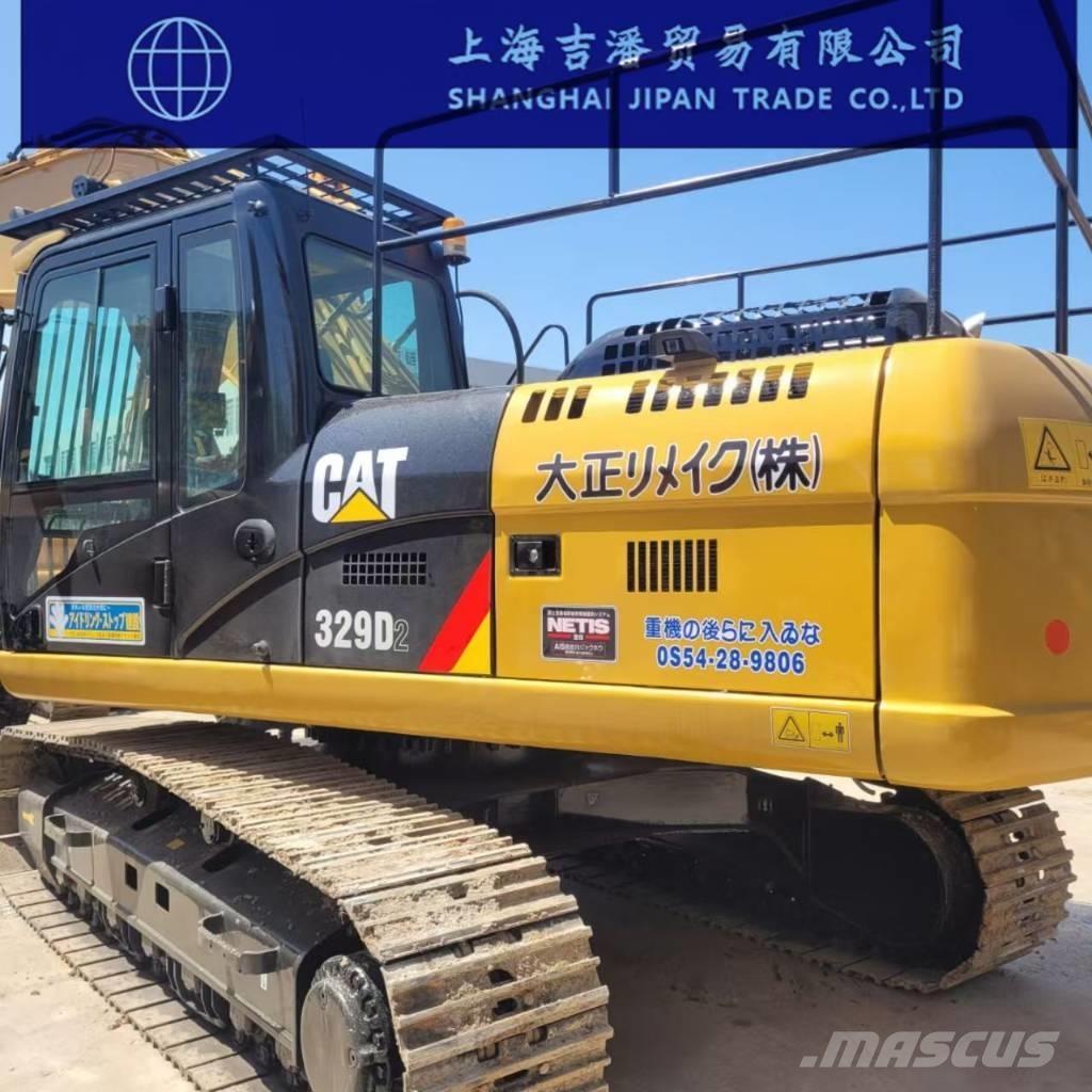 CAT 329 Гусеничні екскаватори