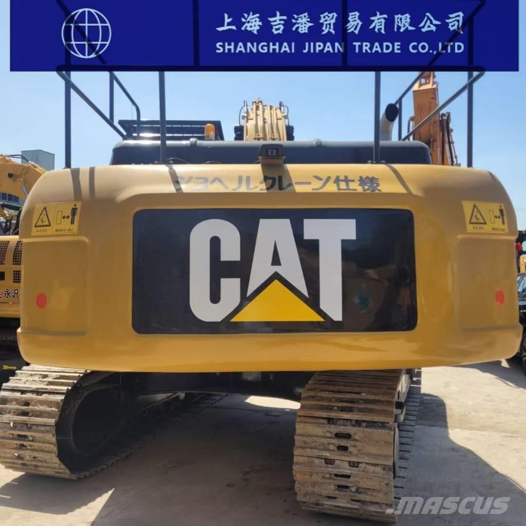 CAT 329 Гусеничні екскаватори