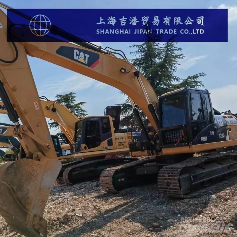 CAT 323 D Гусеничні екскаватори