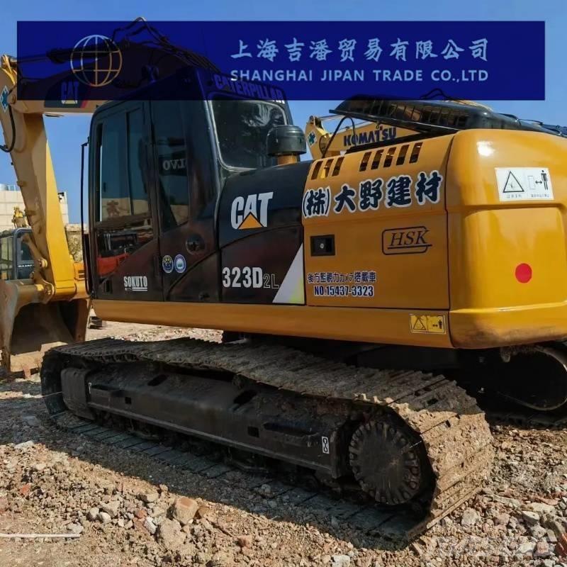 CAT 323 D Гусеничні екскаватори