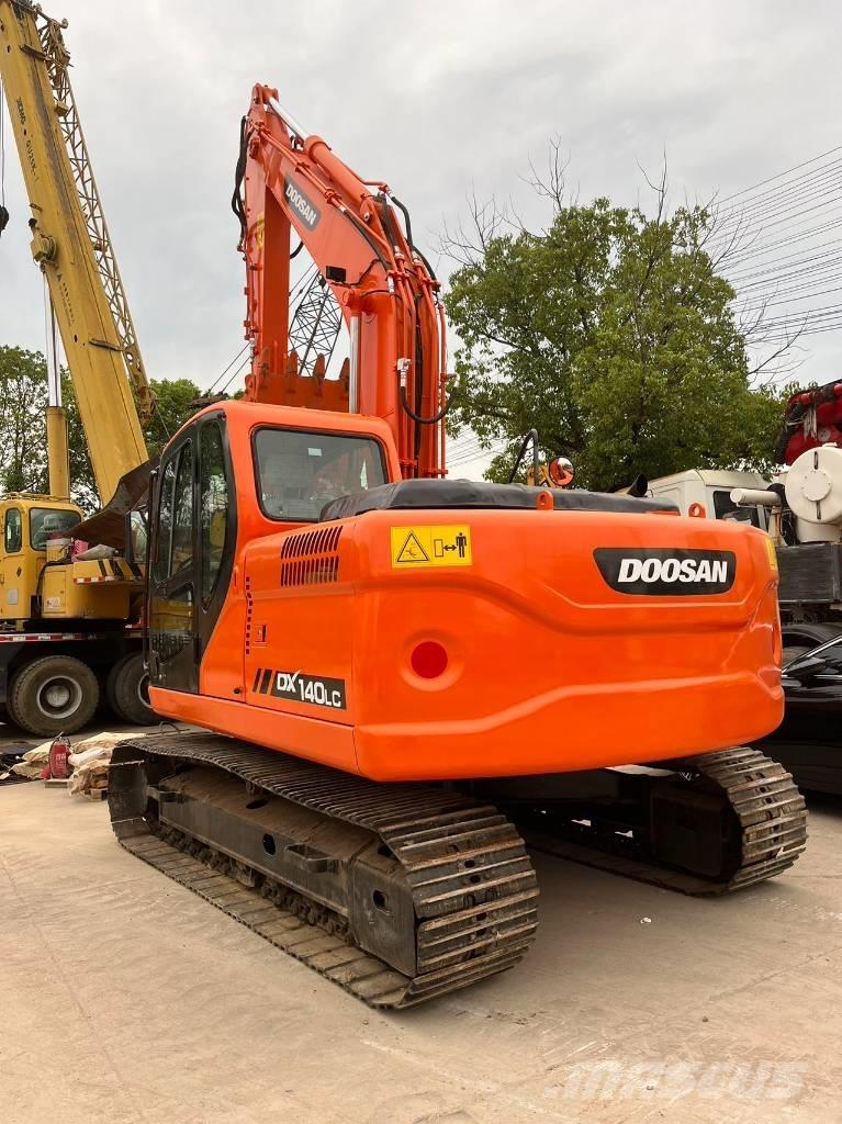 Doosan DX 140 Гусеничні екскаватори