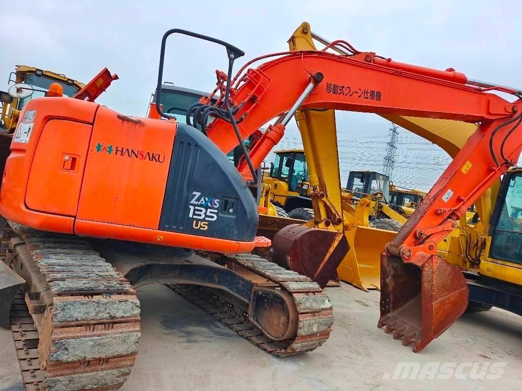 Hitachi ZX 135 US Гусеничні екскаватори