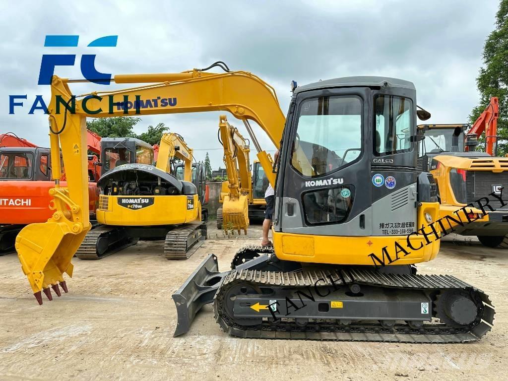 Komatsu PC78US Гусеничні екскаватори