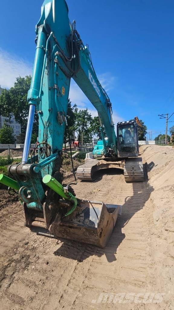 Kobelco SK 210 LC Гусеничні екскаватори