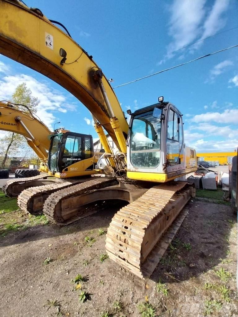 New Holland E 305 Гусеничні екскаватори