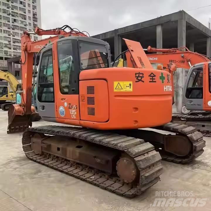 Hitachi ZX135US Гусеничні екскаватори