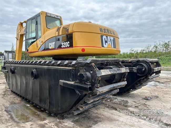 CAT 320 C Екскаватори-амфібії