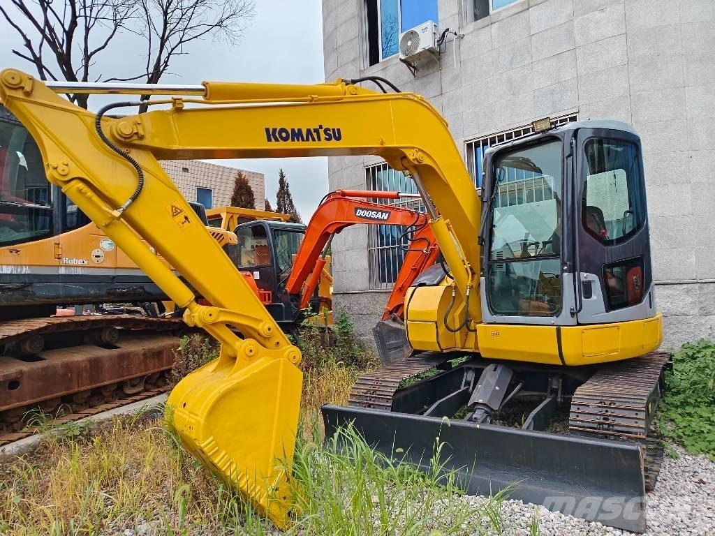 Komatsu PC 78 US Середні екскаватори 7т. - 12т.
