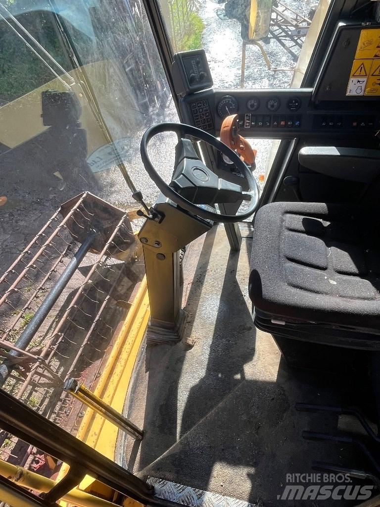 New Holland TC 56 H Зернозбиральні комбайни