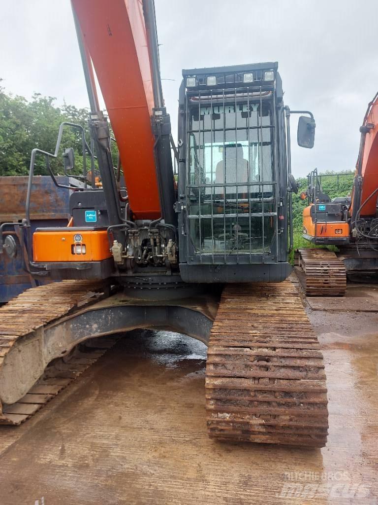 Doosan DX 225 LC-5 Гусеничні екскаватори
