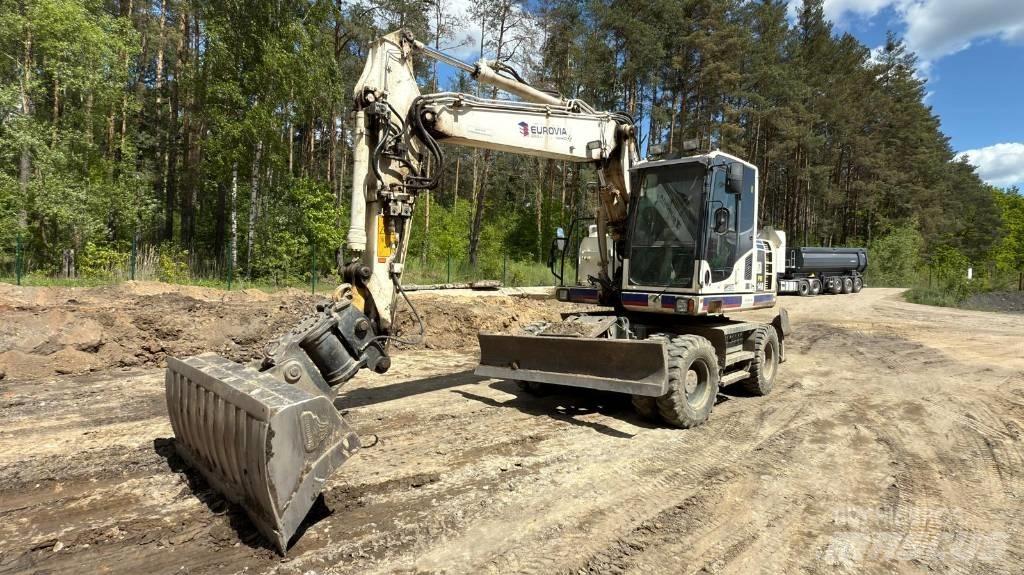 Komatsu PW 148-8 Колісні екскаватори