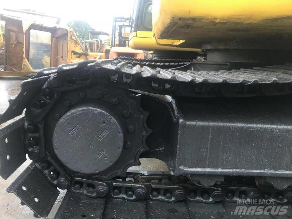 Komatsu pc78us Середні екскаватори 7т. - 12т.