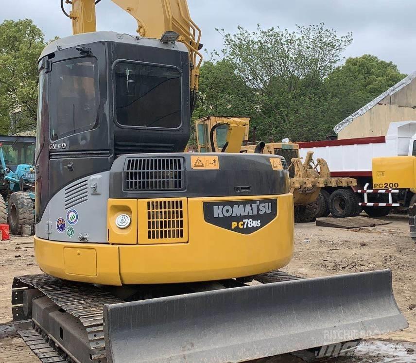 Komatsu pc78us Середні екскаватори 7т. - 12т.