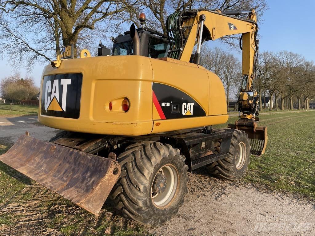 CAT M 313 D Колісні екскаватори