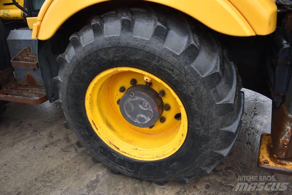 Fermec 965 Екскаватори-навантажувачі