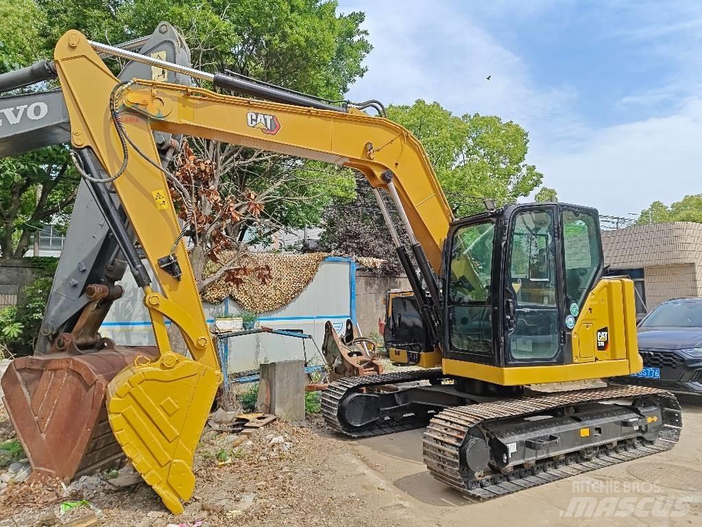 CAT 310 Гусеничні екскаватори