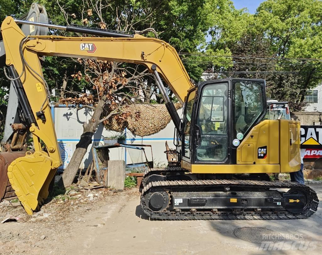 CAT 310 Гусеничні екскаватори