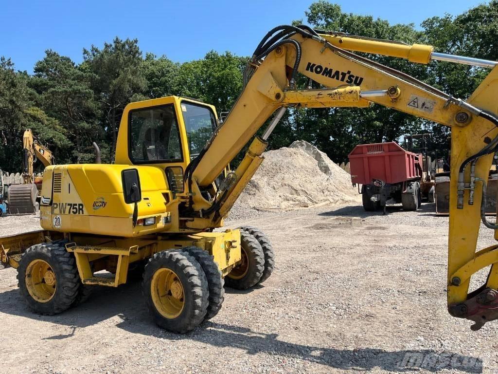Komatsu PW 75 R Колісні екскаватори