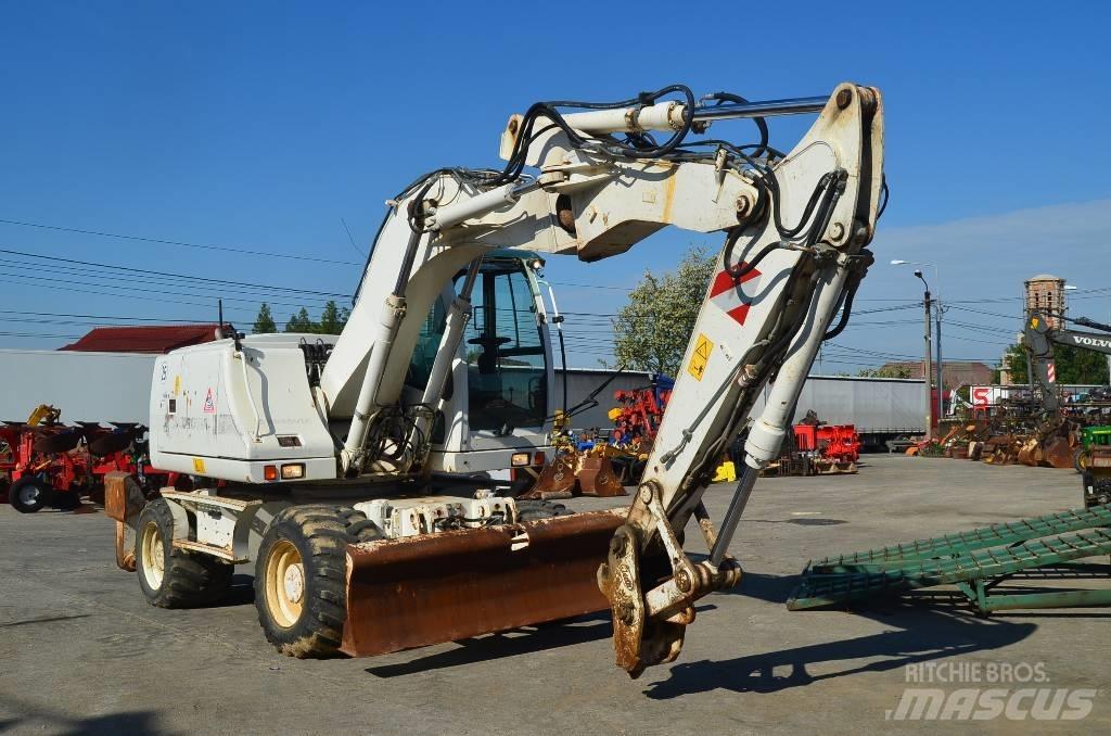 CASE WX 145 Колісні екскаватори