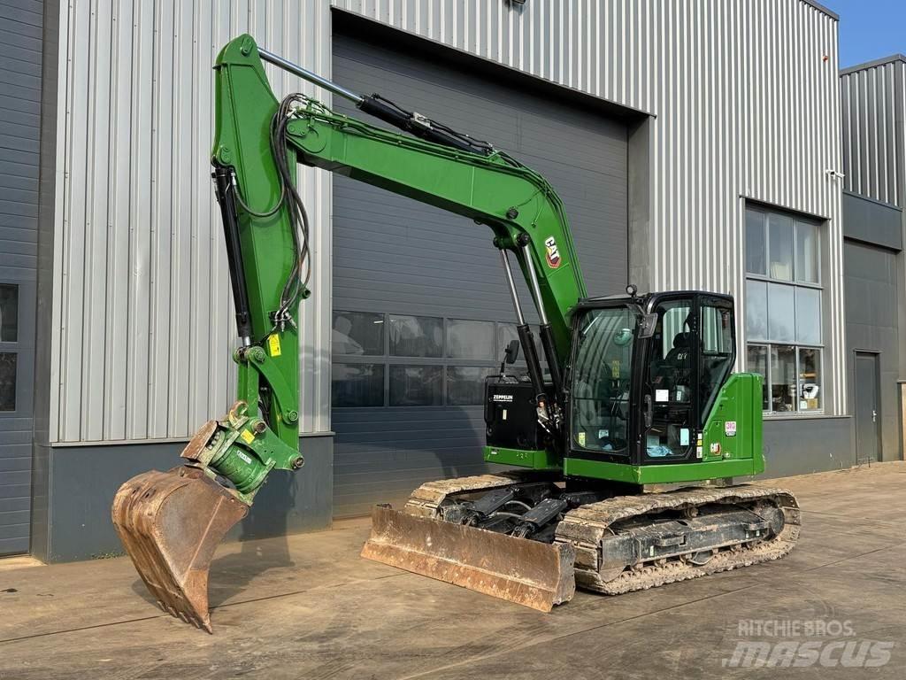 CAT 310 Середні екскаватори 7т. - 12т.