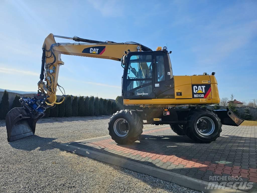 CAT 313 D Колісні екскаватори