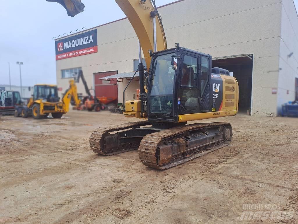 CAT 323FLN IHC Гусеничні екскаватори