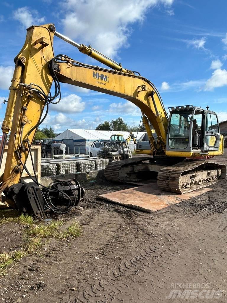 New Holland E 265 Гусеничні екскаватори